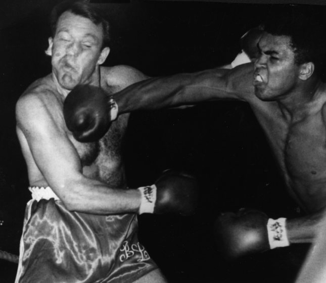 6 AUG 1966:  Cassius Clay (Muhammad Ali) lands a right to the head of Brian London during their World Heavyweight Title fight at Earls Court. Ali won by a knockout in the third round. Mandatory Credit: Allsport Hulton/Archive